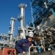 worker in oil refinery, DSP oil and gas and flow measurement, Security Track and Trace